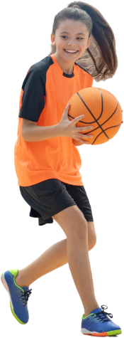 young girl with pony tail in orange playing basketball